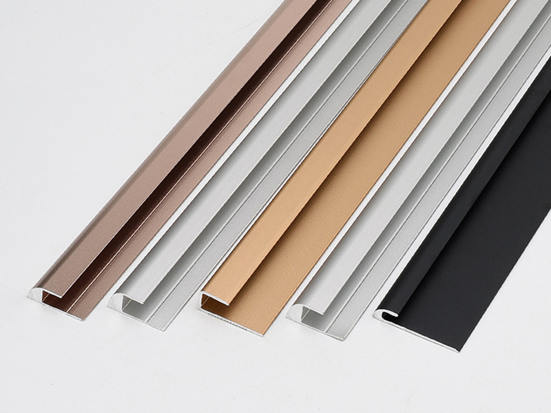 شريط حواف للأرضية على شكل حرف C باللون الذهبي الوردي